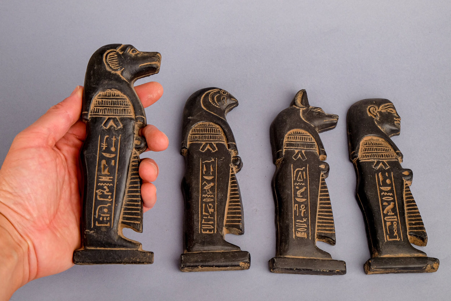 Amazing Four (Anubis - Isis - Baboon - Horus) The four gods holding the feather of Ma’at - made from Basalt stone - made in Egypt