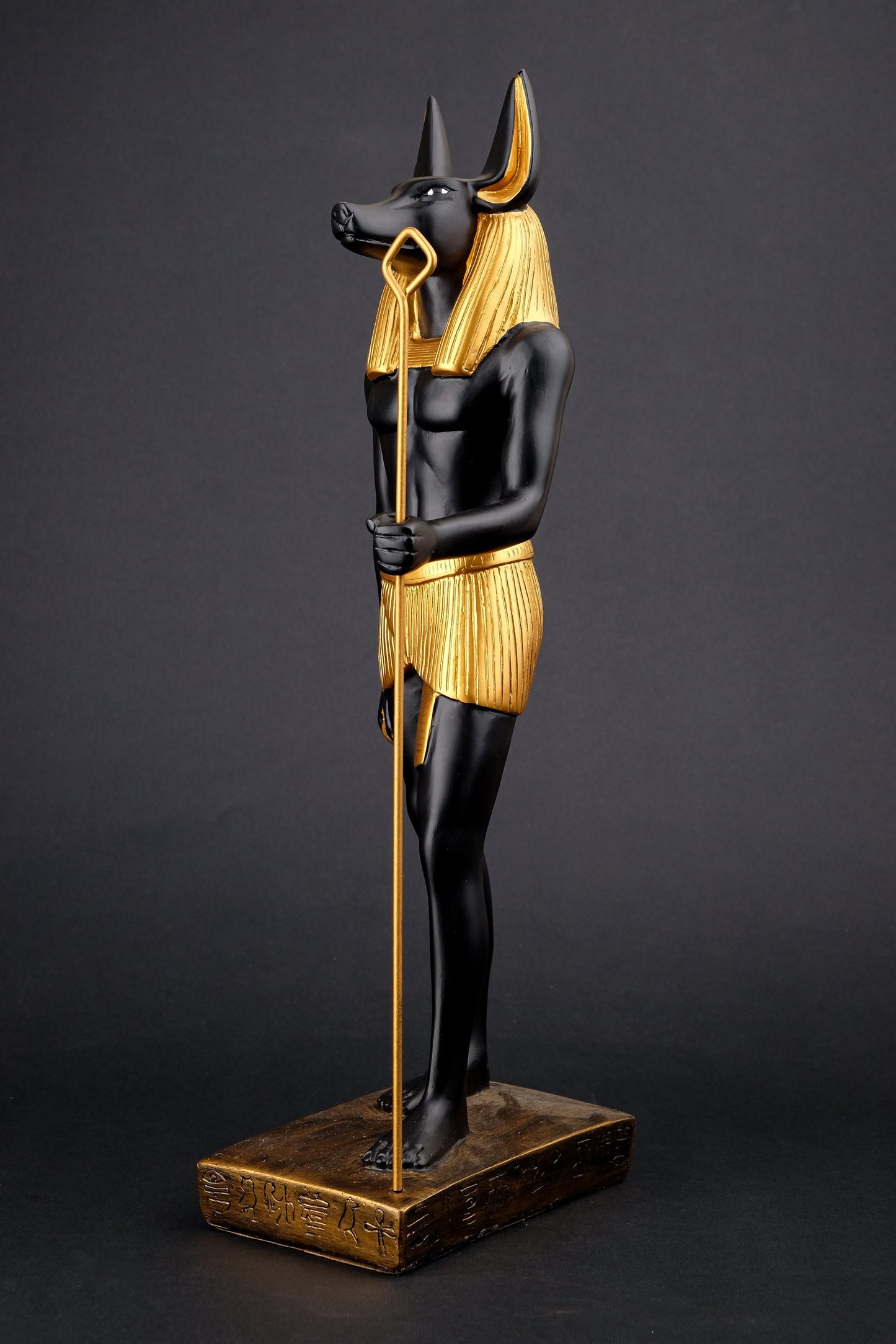 A unique ancient Egyptian statue of Anubis Jackal God of afterlife and mummification unique large gold and black hand painted