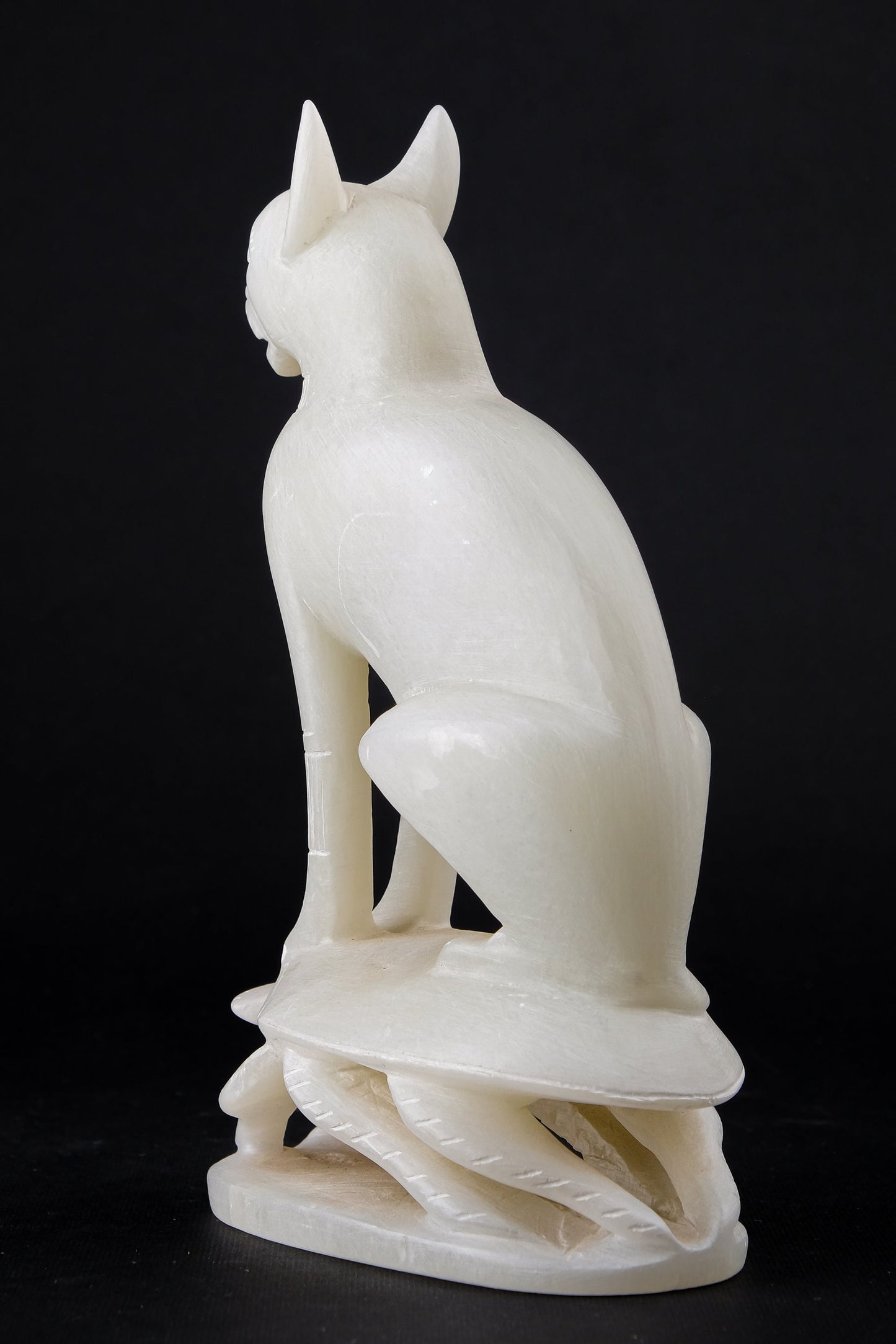 Ancient Egyptian statue of goddess Bastet cat sits on Scarab amulet sculpture hand carved Soap stone made in Egypt