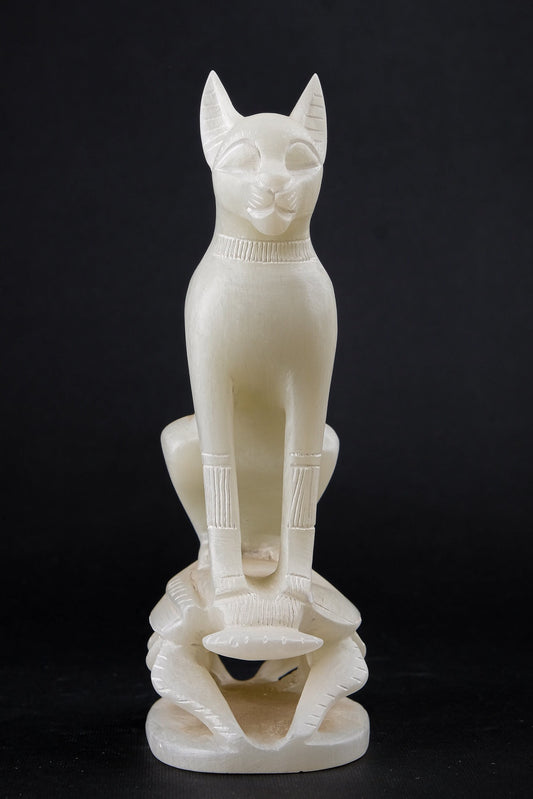 Ancient Egyptian statue of goddess Bastet cat sits on Scarab amulet sculpture hand carved Soap stone made in Egypt