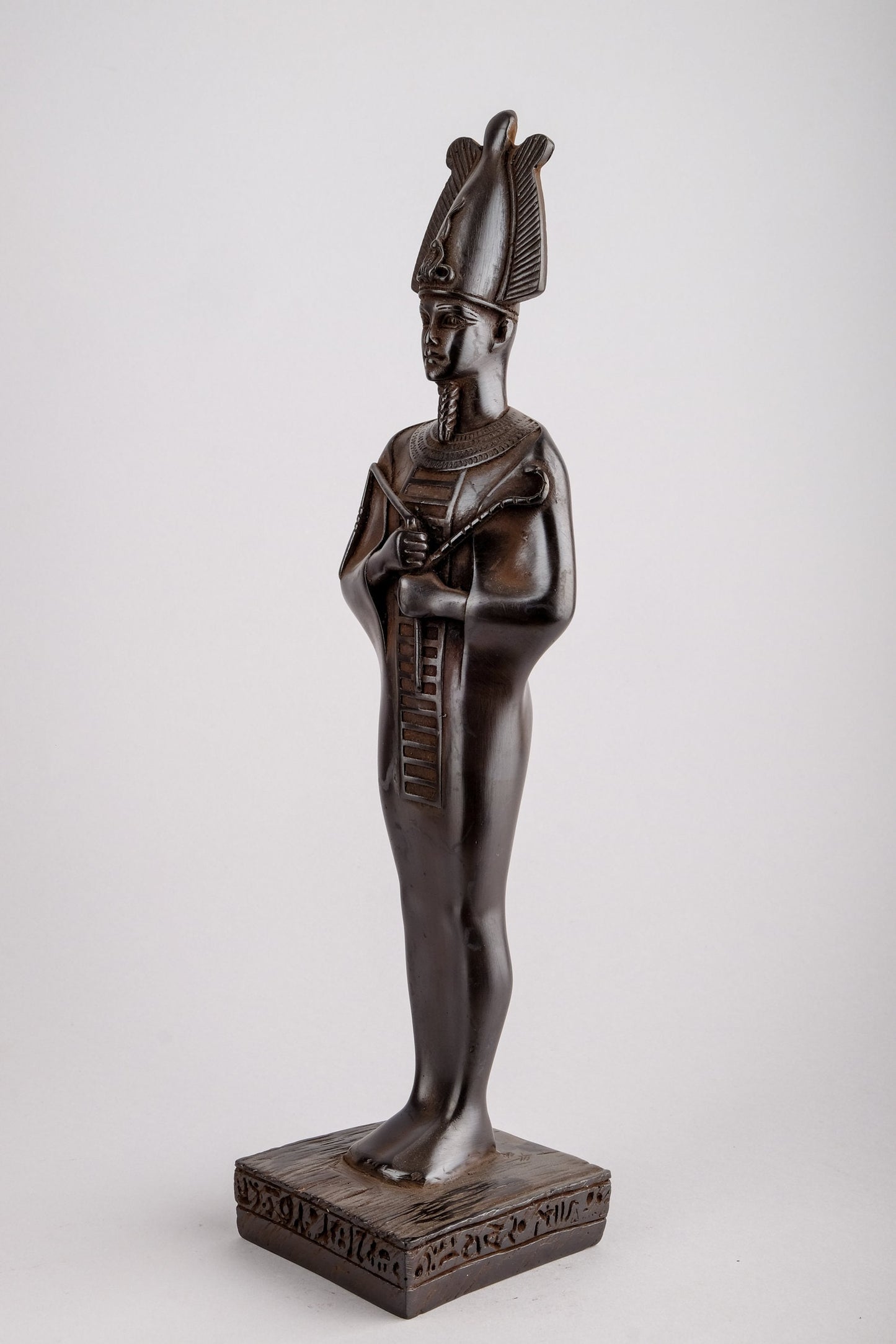 Statue god Osiris lord of the dead made in Egypt. The first one associated with a mummy wrap