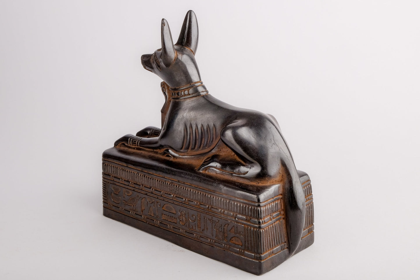 Ancient Egyptian statue of Anubis Jackal Symbol of afterlife and mummification seated to protect the tomb, heavy black stone made in Egypt