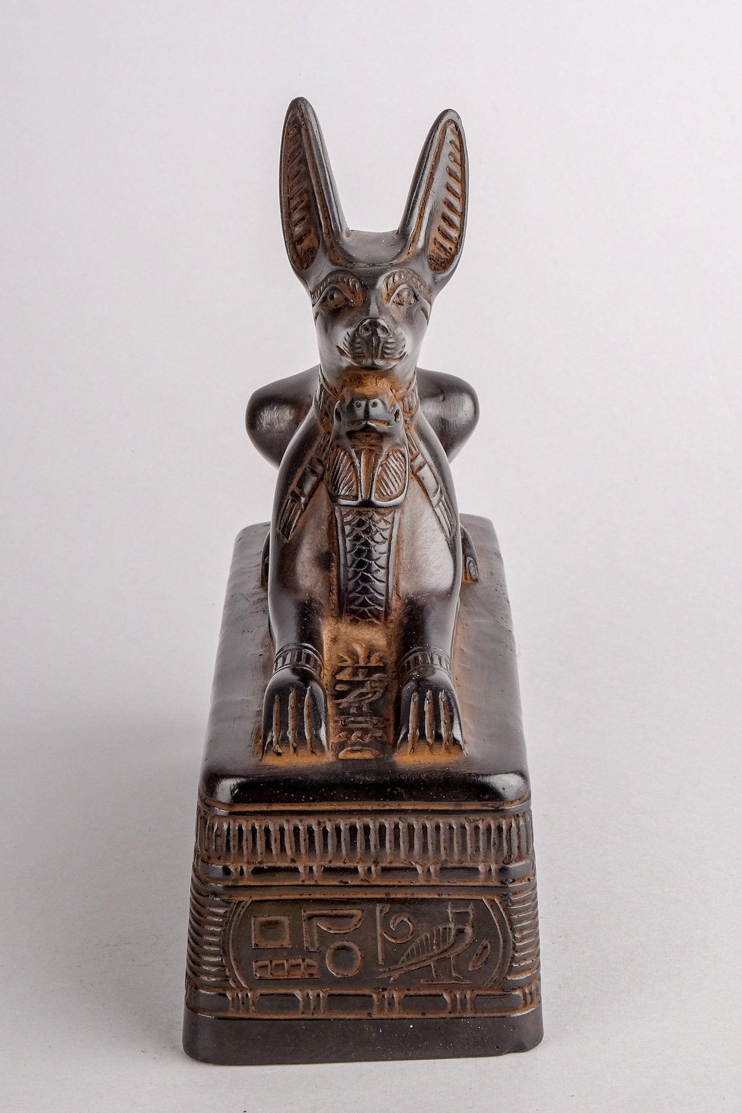 Ancient Egyptian statue of Anubis Jackal Symbol of afterlife and mummification seated to protect the tomb, heavy black stone made in Egypt