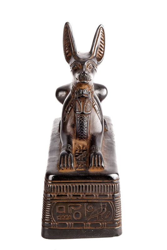 Ancient Egyptian statue of Anubis Jackal Symbol of afterlife and mummification seated to protect the tomb, heavy black stone made in Egypt