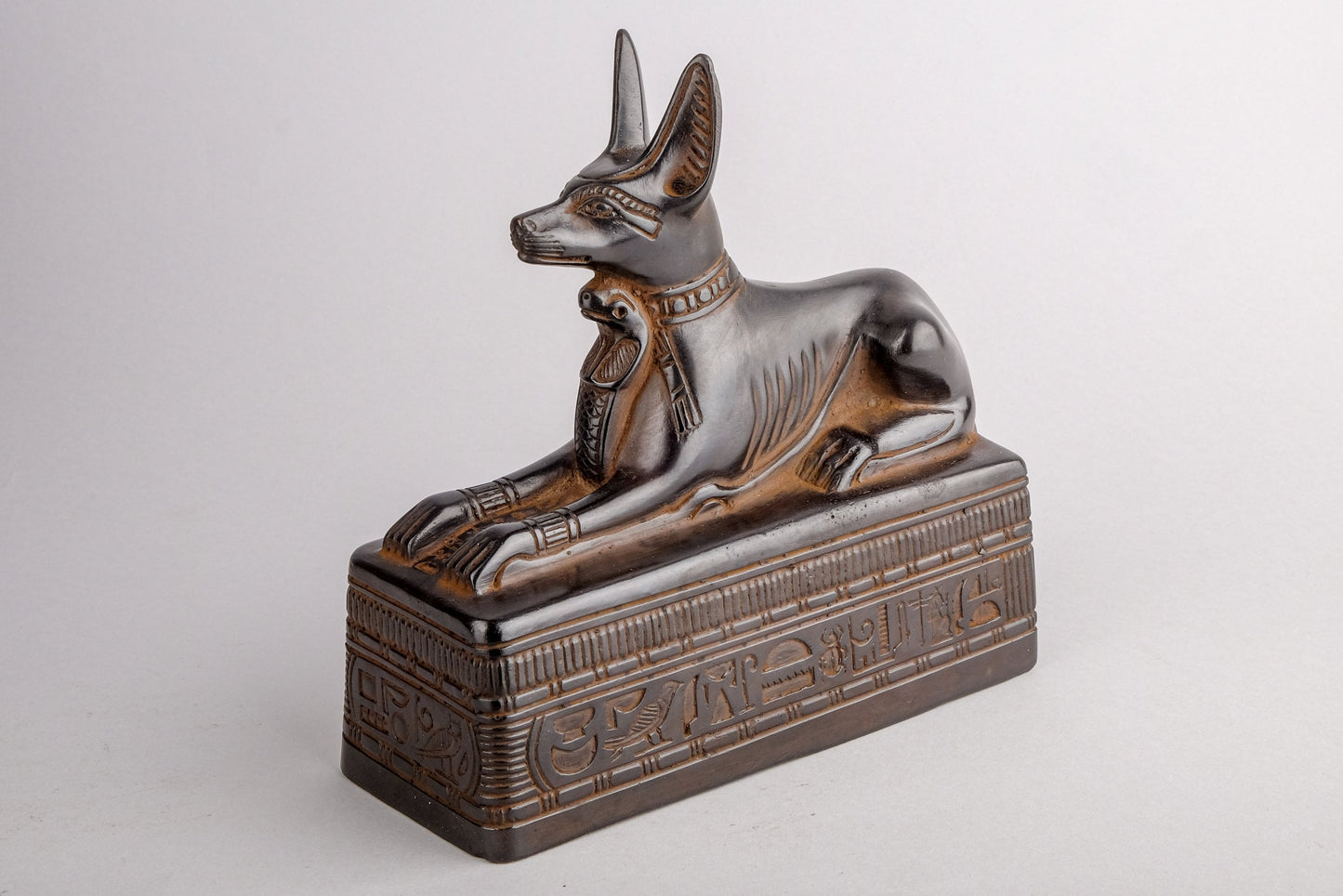 Ancient Egyptian statue of Anubis Jackal Symbol of afterlife and mummification seated to protect the tomb, heavy black stone made in Egypt