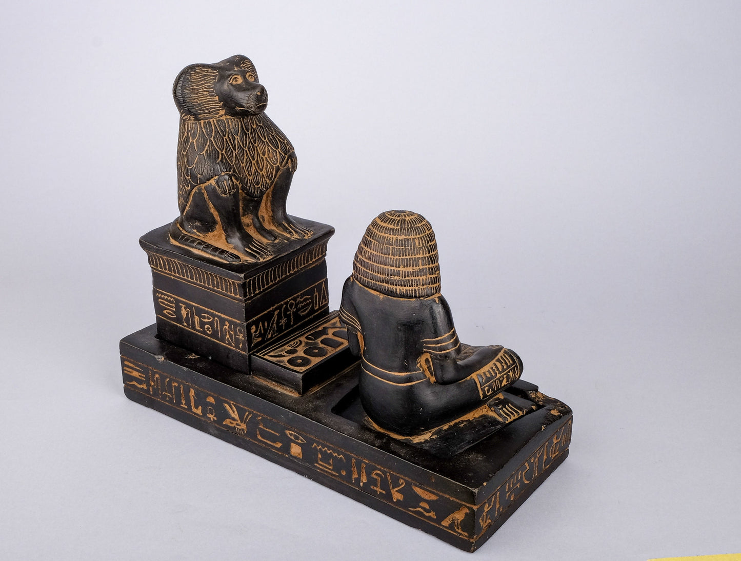 Unique Ancient Egyptian statue of The royal Scribe Nebmertuf writing under the protection of the Moon God Thoth