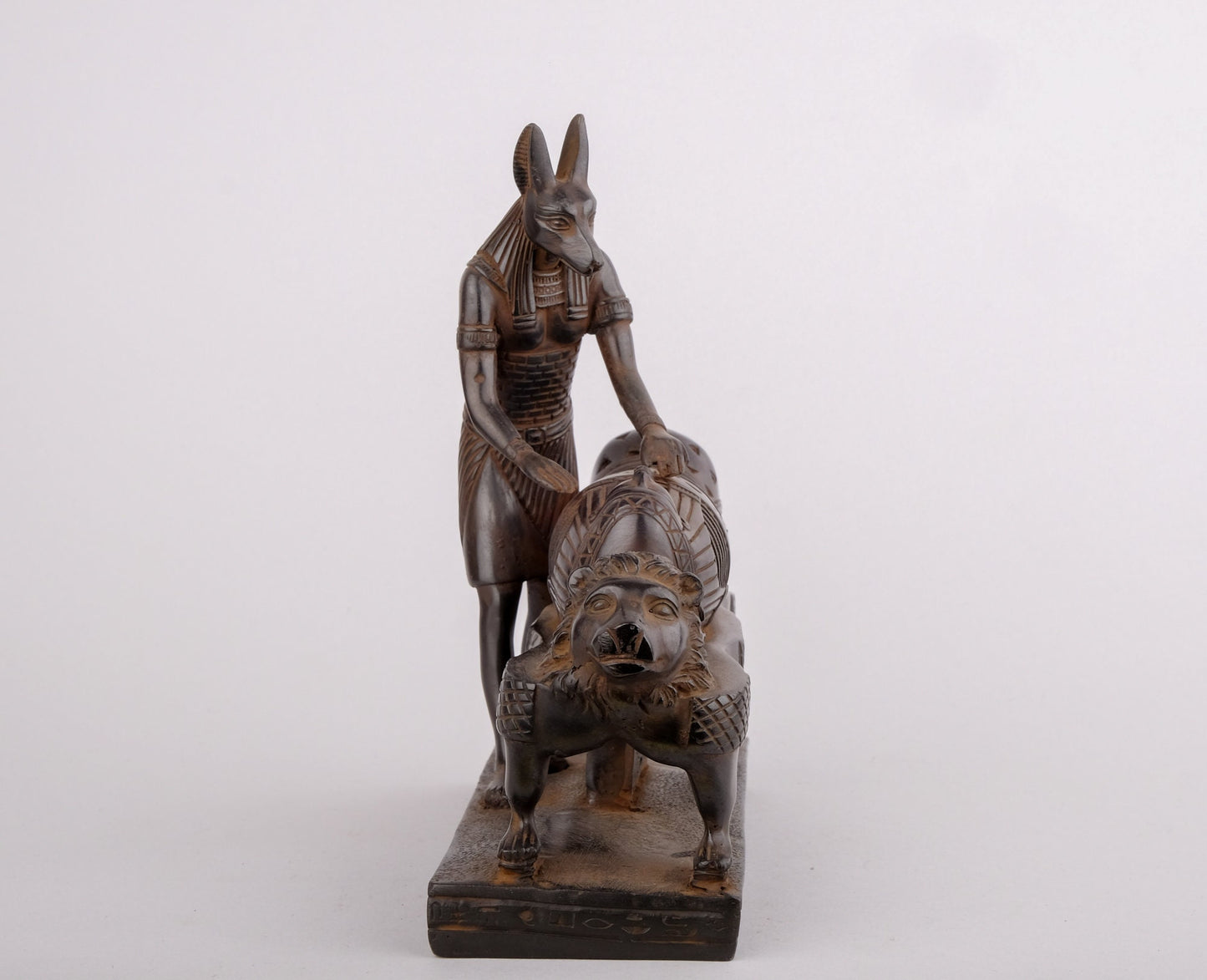 Egyptian god of afterlife Anubis mummify king Tutankhamun. God of underworld, king Tutankhamun . Heavy black made in Egypt