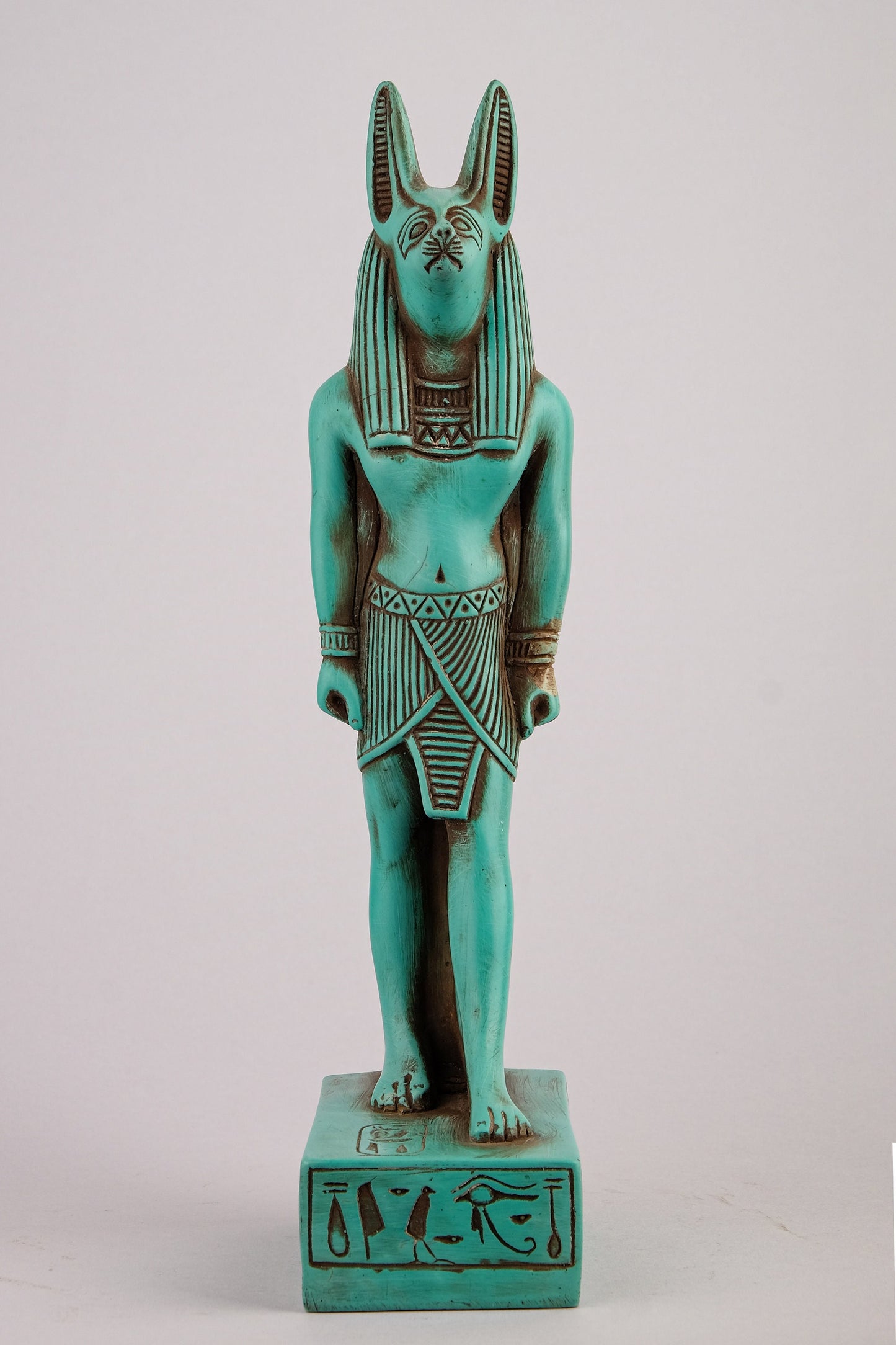 A unique ancient Egyptian statue of Anubis Jackal God of afterlife and mummification standing with jackal head and human body