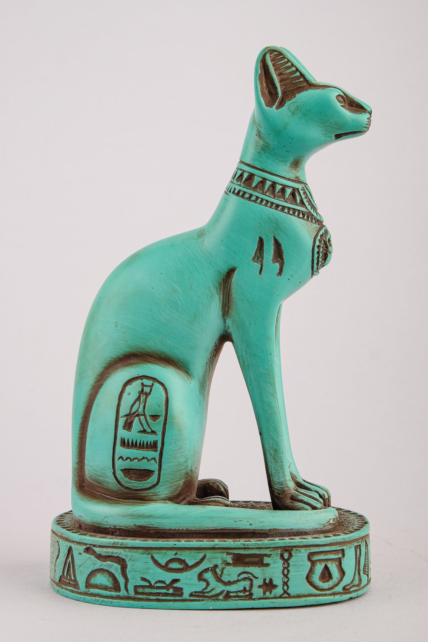 Unique goddess Bastet cat Statue heavy green stone with scarab on her chest, symbols hieroglyphic inscriptions around the base made in Egypt