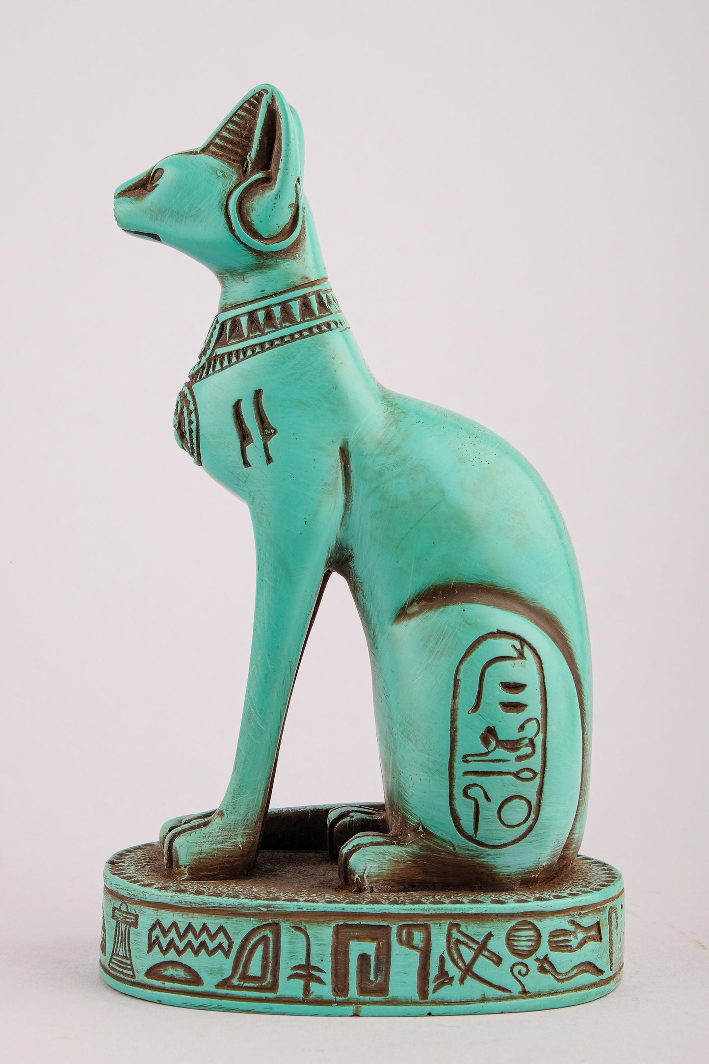 Unique goddess Bastet cat Statue heavy green stone with scarab on her chest, symbols hieroglyphic inscriptions around the base made in Egypt