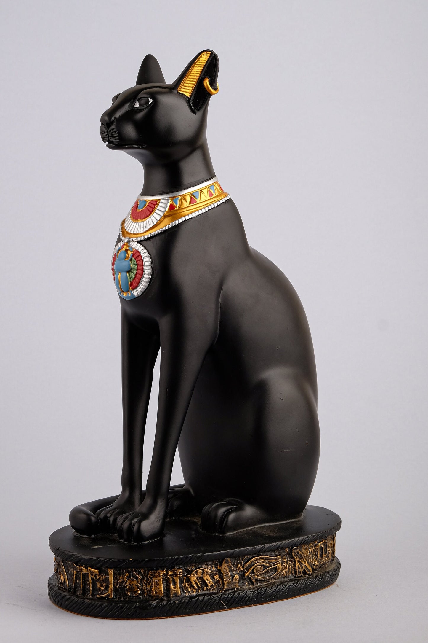 Egyptian Bastet cat statue handcrafted paint Black with scarab on her chest, symbols hieroglyphic inscriptions around the base made in Egypt