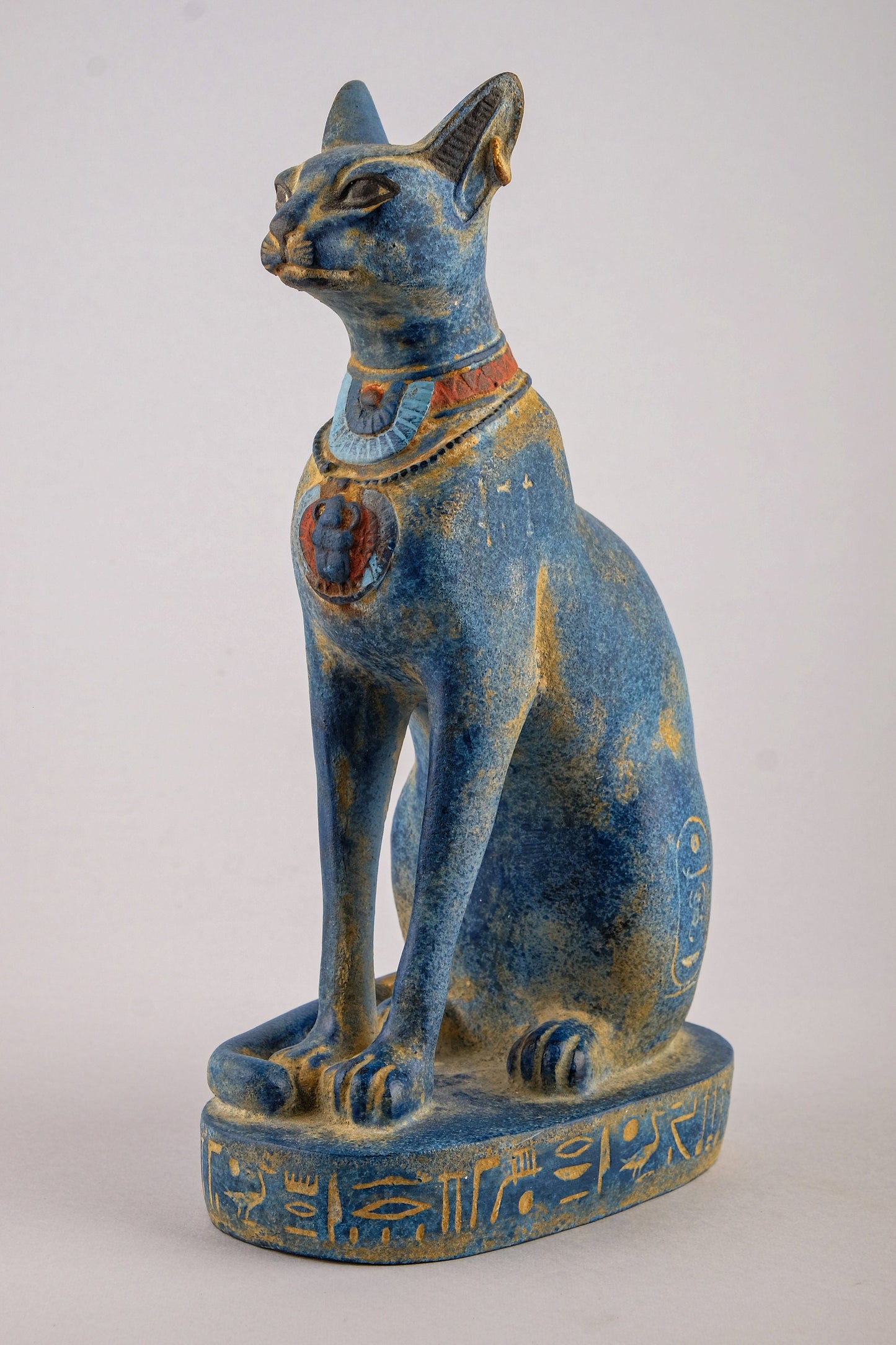 Unique Egyptian Bastet cat Statue heavy blue stone sculpture with scarab on her chest, symbols hieroglyphic inscriptions around the base