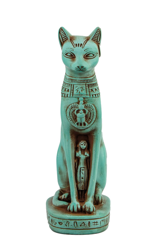 Egyptian statue of goddess Bastet cat heavy green stone made in Egypt. Bastet in her late form of a cat-headed woman, rather than a lioness