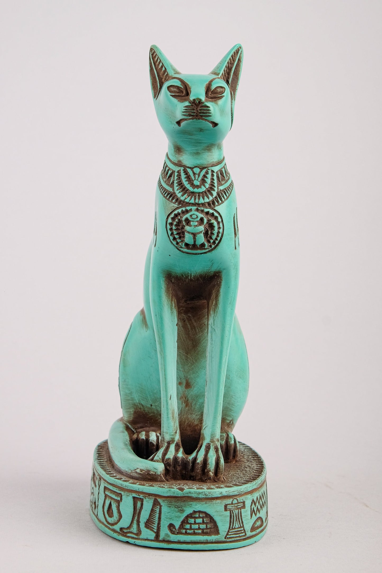 Unique goddess Bastet cat Statue heavy green stone with scarab on her chest, symbols hieroglyphic inscriptions around the base made in Egypt