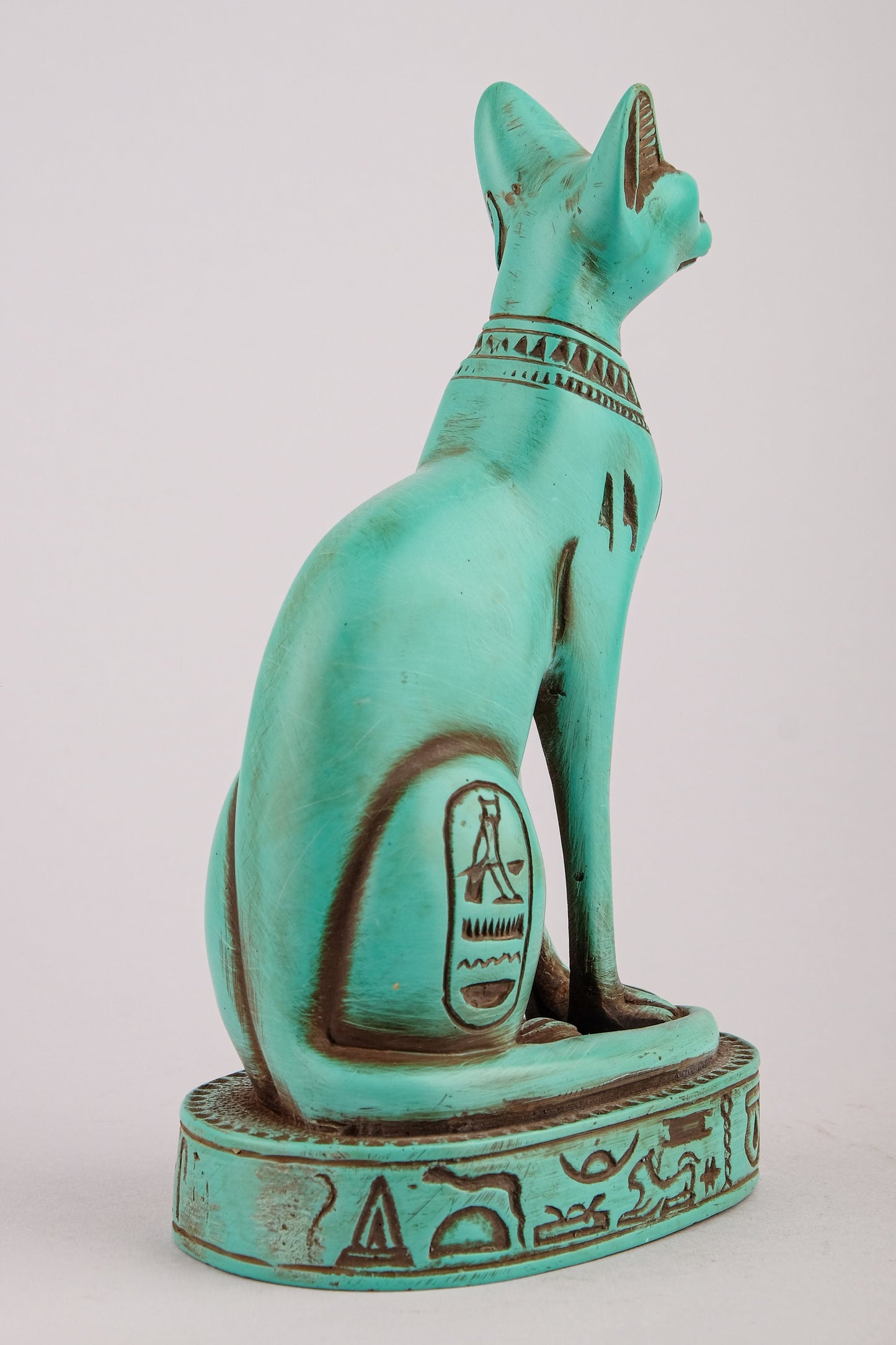 Unique goddess Bastet cat Statue heavy green stone with scarab on her chest, symbols hieroglyphic inscriptions around the base made in Egypt