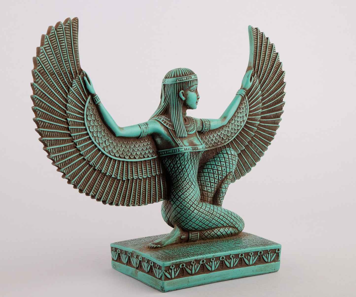 Egyptian statue of Isis made of green limestone made in Egypt