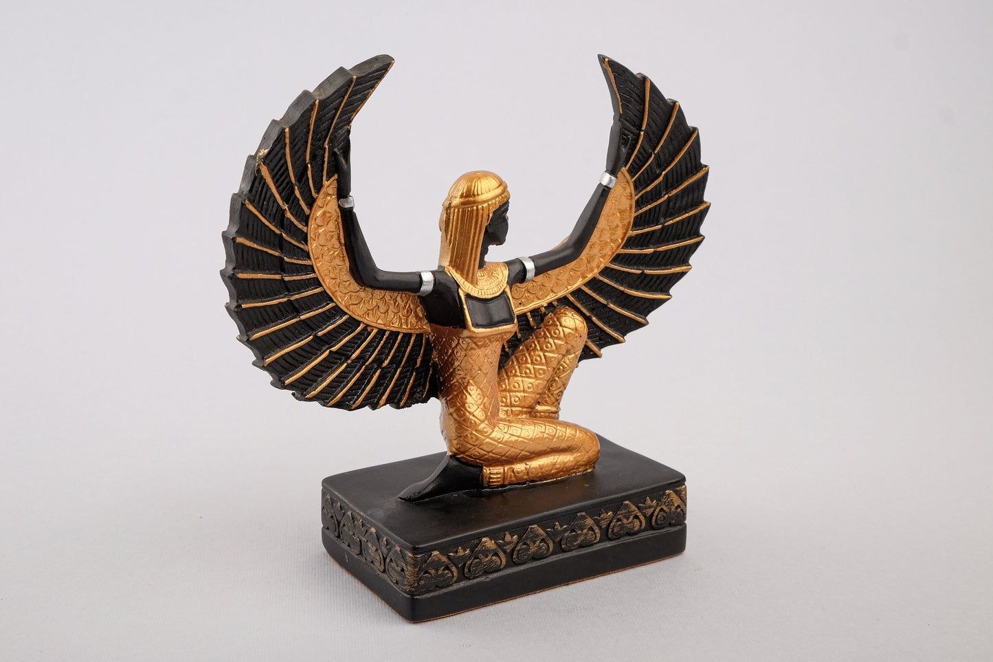 Egyptian statue of Isis wings symbol of fertility