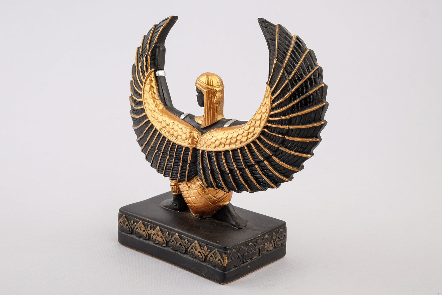 Egyptian statue of Isis wings symbol of fertility