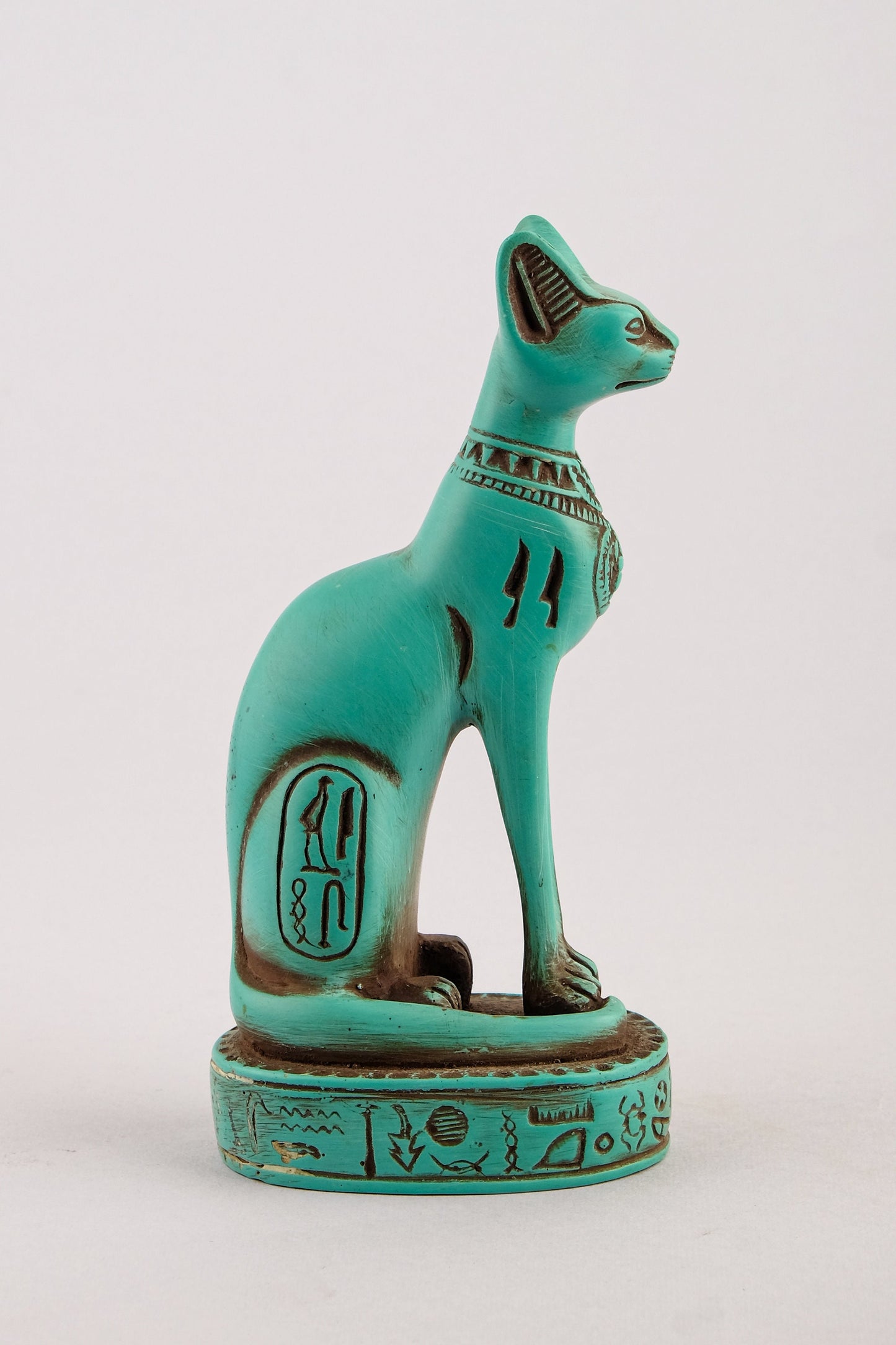 Ancient Egyptian Bastet cat Statue heavy green stone with scarab on her chest, symbols hieroglyphic inscriptions around the base