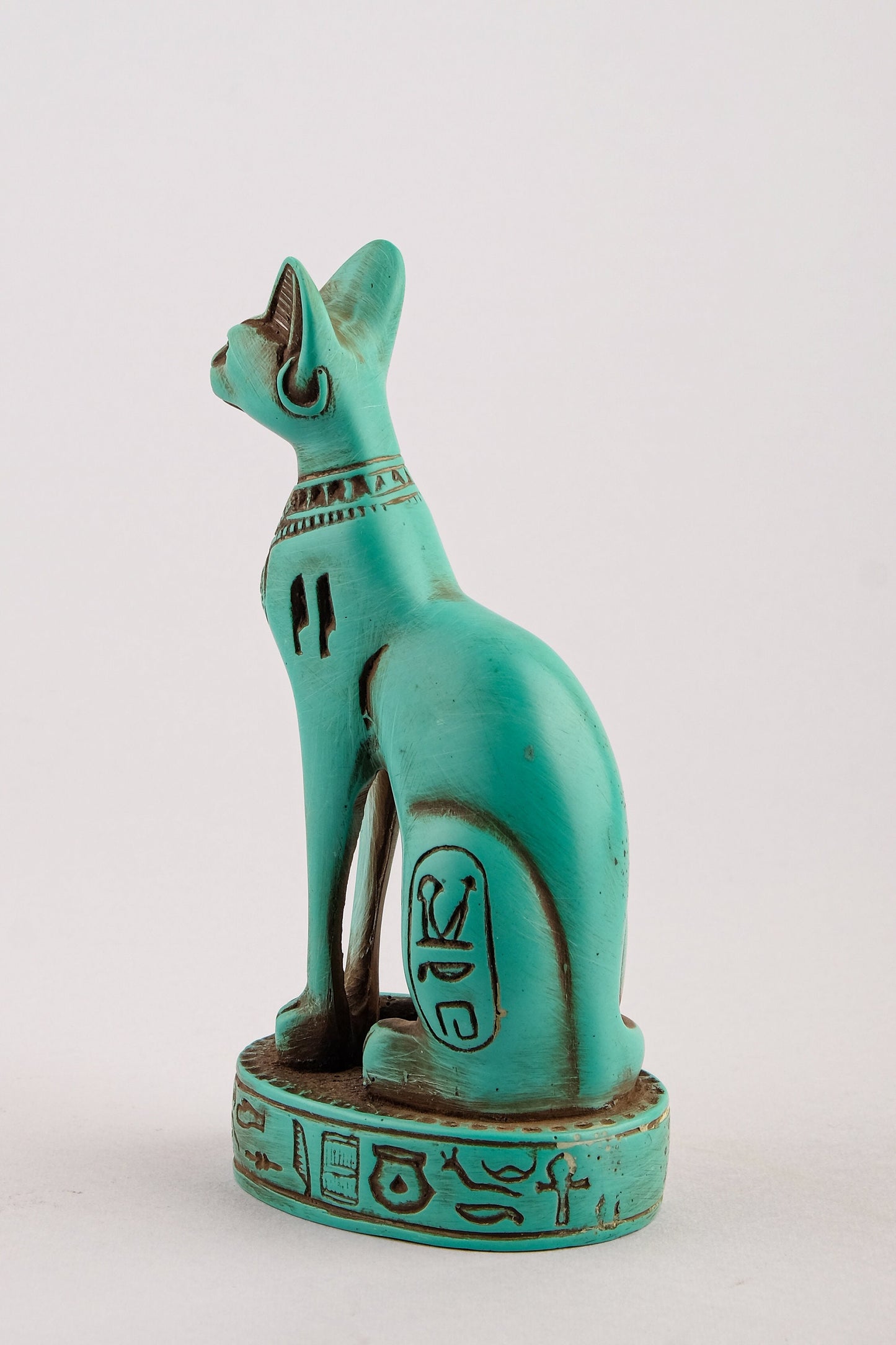 Ancient Egyptian Bastet cat Statue heavy green stone with scarab on her chest, symbols hieroglyphic inscriptions around the base