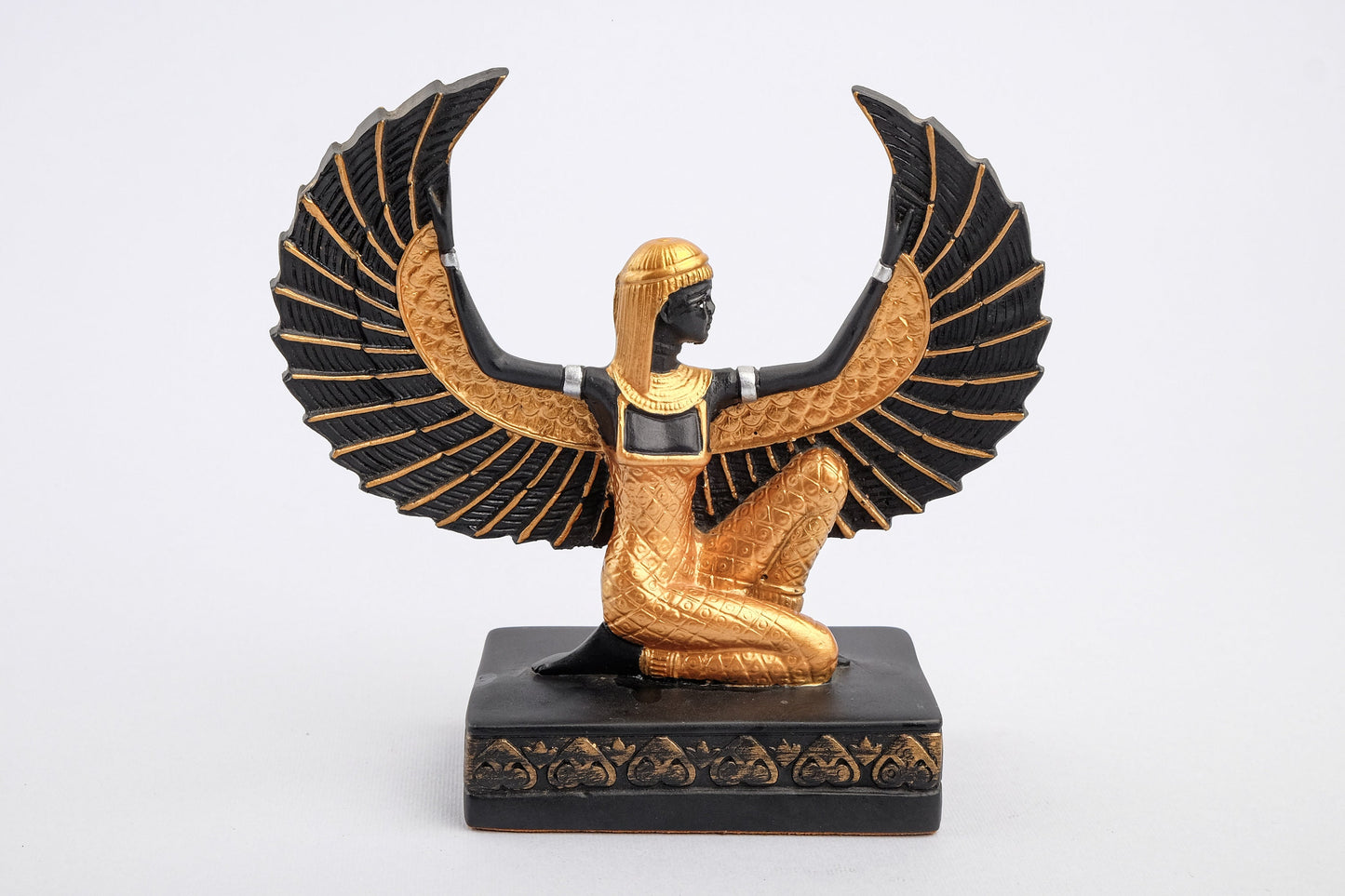 Egyptian statue of Isis wings symbol of fertility