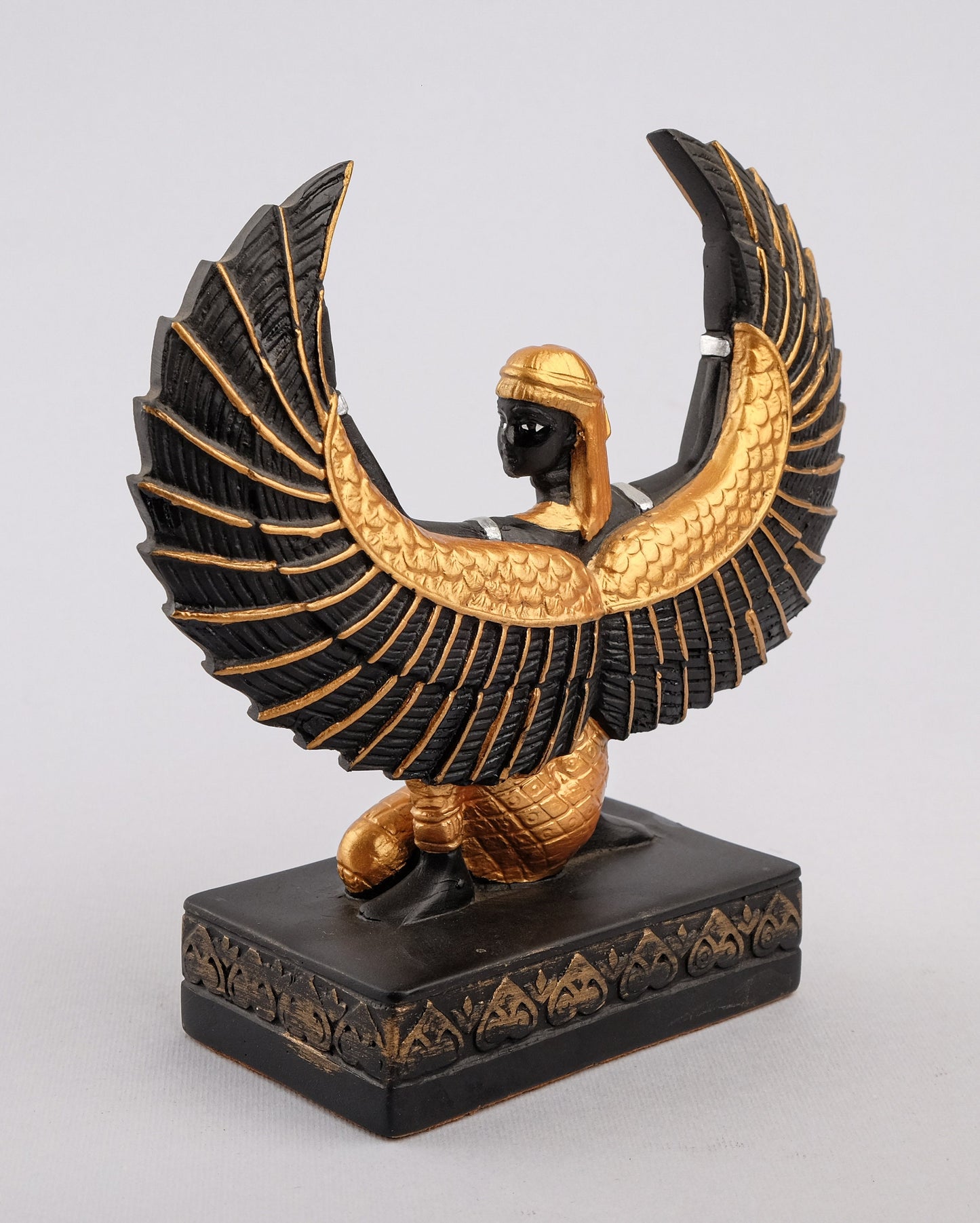 Egyptian statue of Isis wings symbol of fertility