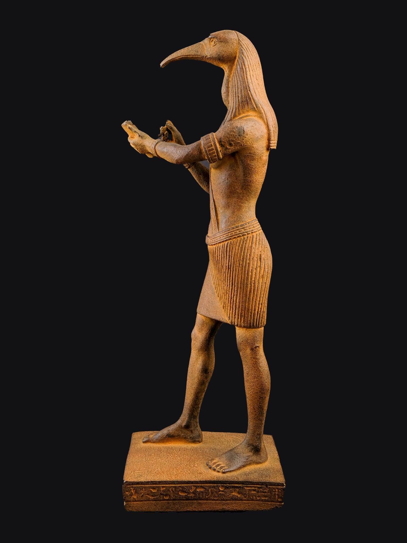 Egyptian statue of Thoth God of moon, magic, and master of knowledge